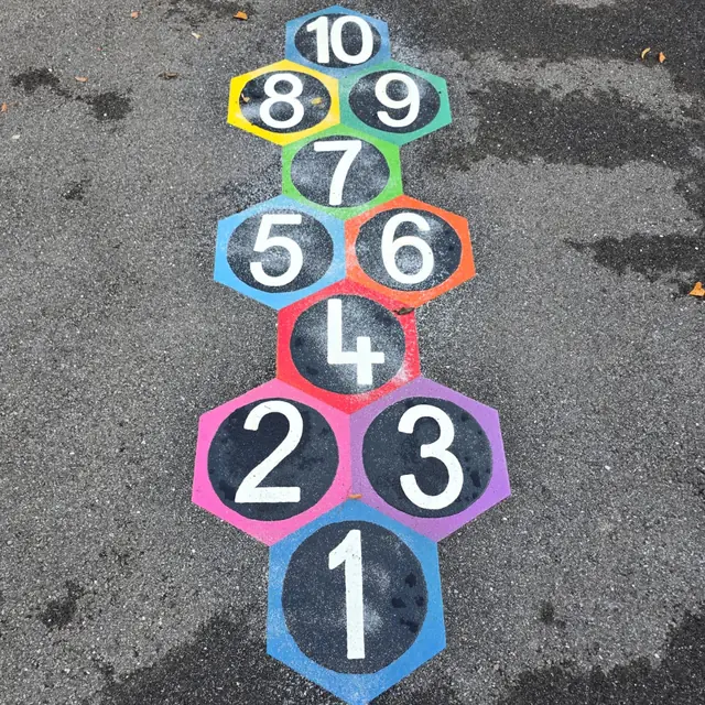 A hopscotch of coloured hexagons numbered 1 to 10